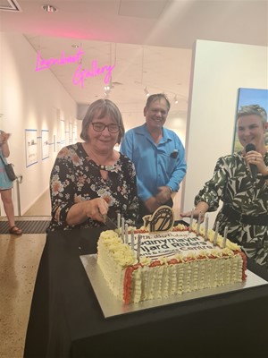 September - Mayor Lis Clark photos - Cutting the cake at GYRACC's 10th